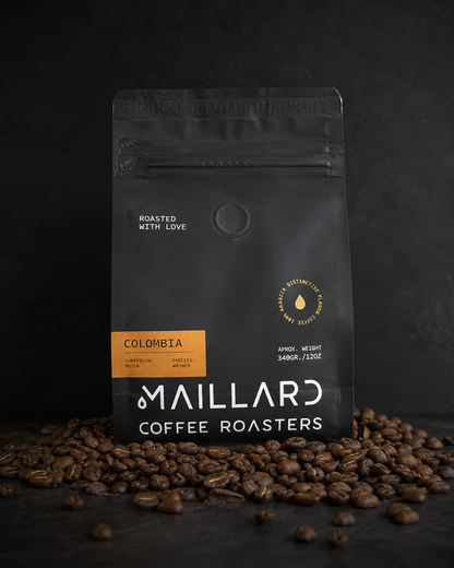 Freshly roasted Colombia Huila washed coffee from Maillard Coffee Roasters with milk chocolate, caramel, apple, and cherry tasting notes.